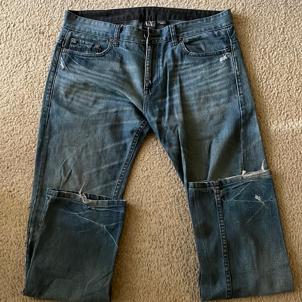 Armani exchange blue jeans. A bit distressed look. 34 waist.